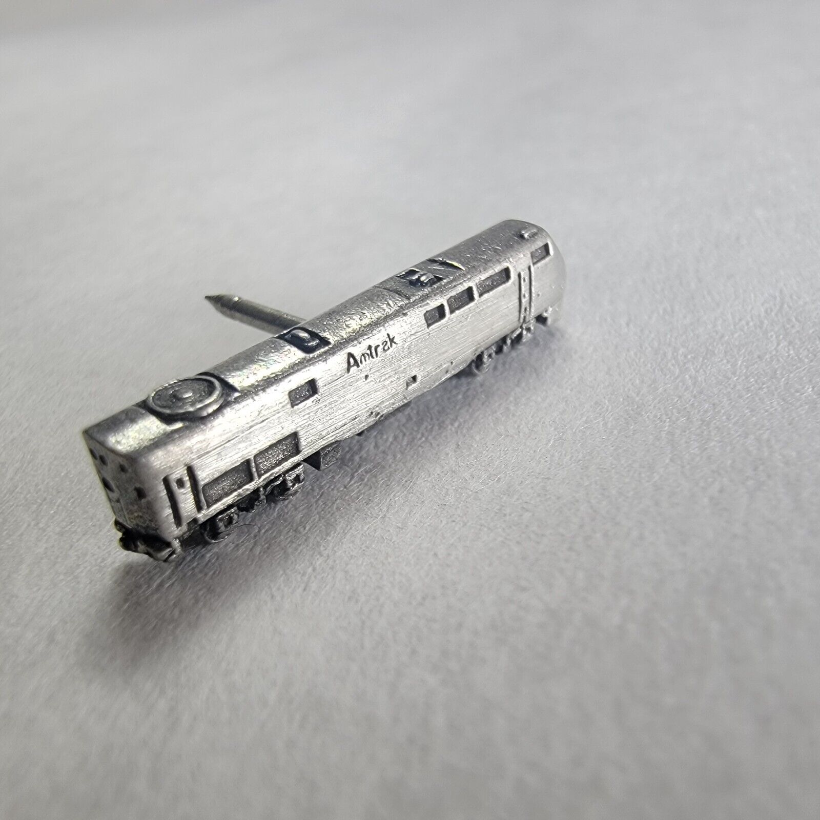 Vintage GE Amtrak Transportation Systems Lapel Hat Pin Tie Tack