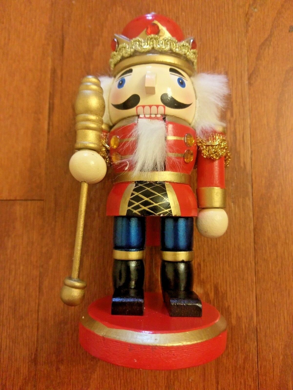 SMALL ROYAL KING NUTCRACKER WITH RED OUTFIT AND GOLD CROWN WITH JEWELS (8” TALL)