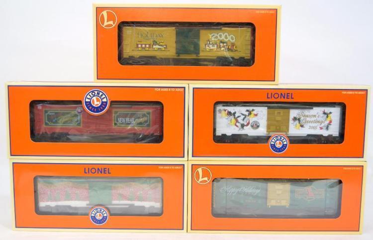 Five Lionel O gauge Christmas box cars in original boxes MIB Lot 288
