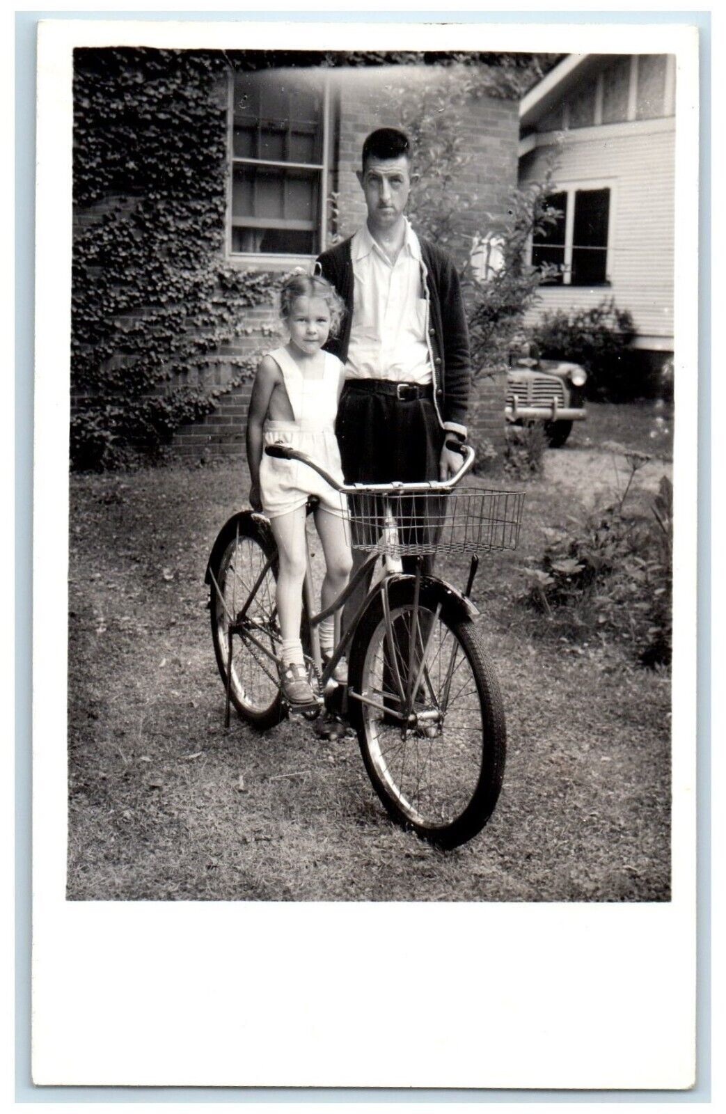 1933 Father And Child Bicycle House Car Scene Vintage RPPC Photo Postcard