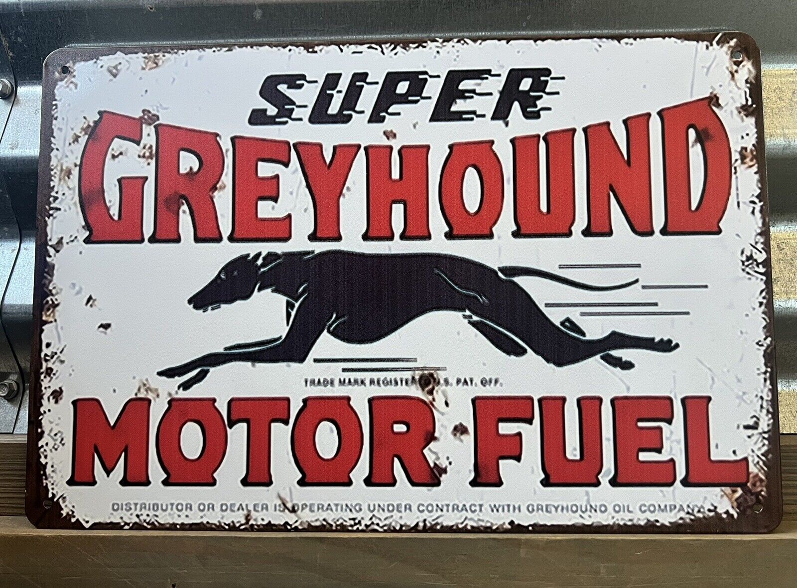 SUPER GREYHOUND MOTOR FUEL TIN SIGN 8\