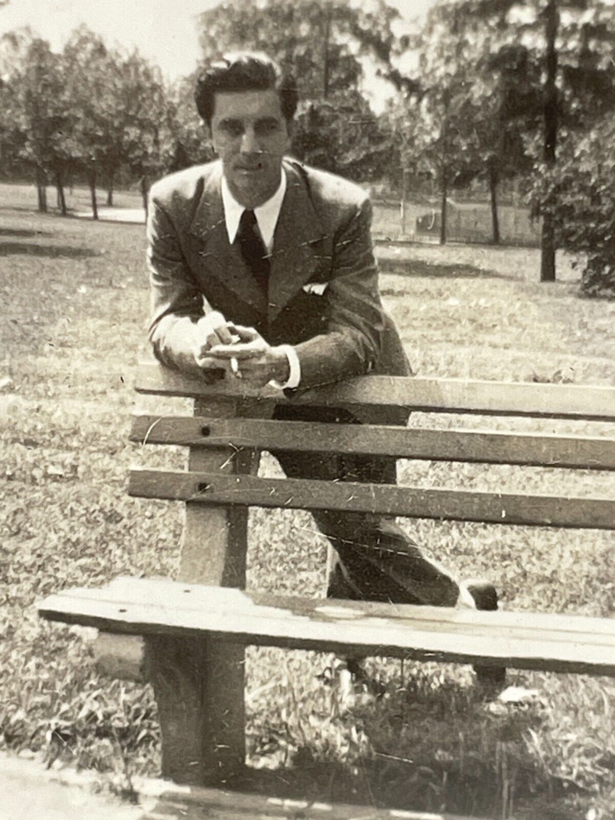 WB Photograph Handsome Man Wearing Suit Leaning On Park Bench 1940\'s 