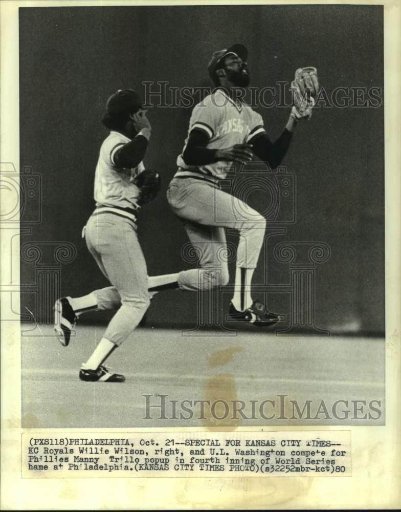 1980 Press Photo Royals\' Willie Wilson & U.L. Washington Compete for Popup