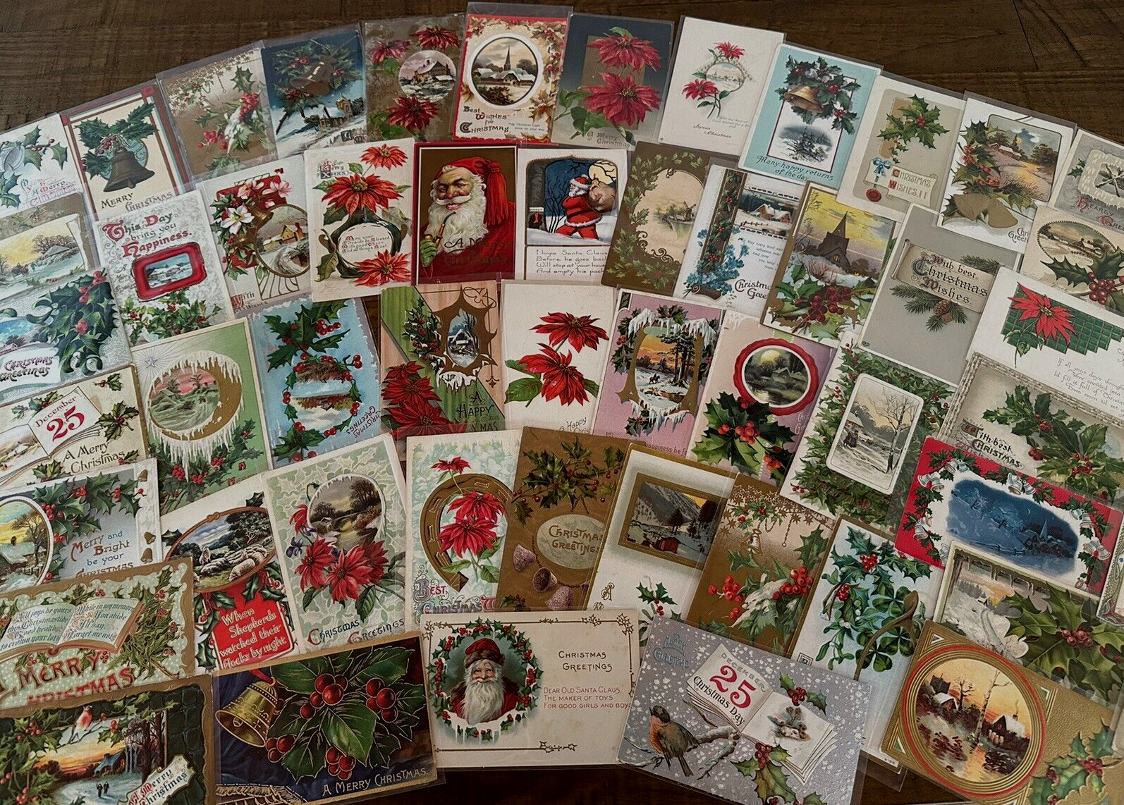 Huge Lot of 62 Antique Christmas~ Xmas Postcards~3 Santa's~in sleeves~h842