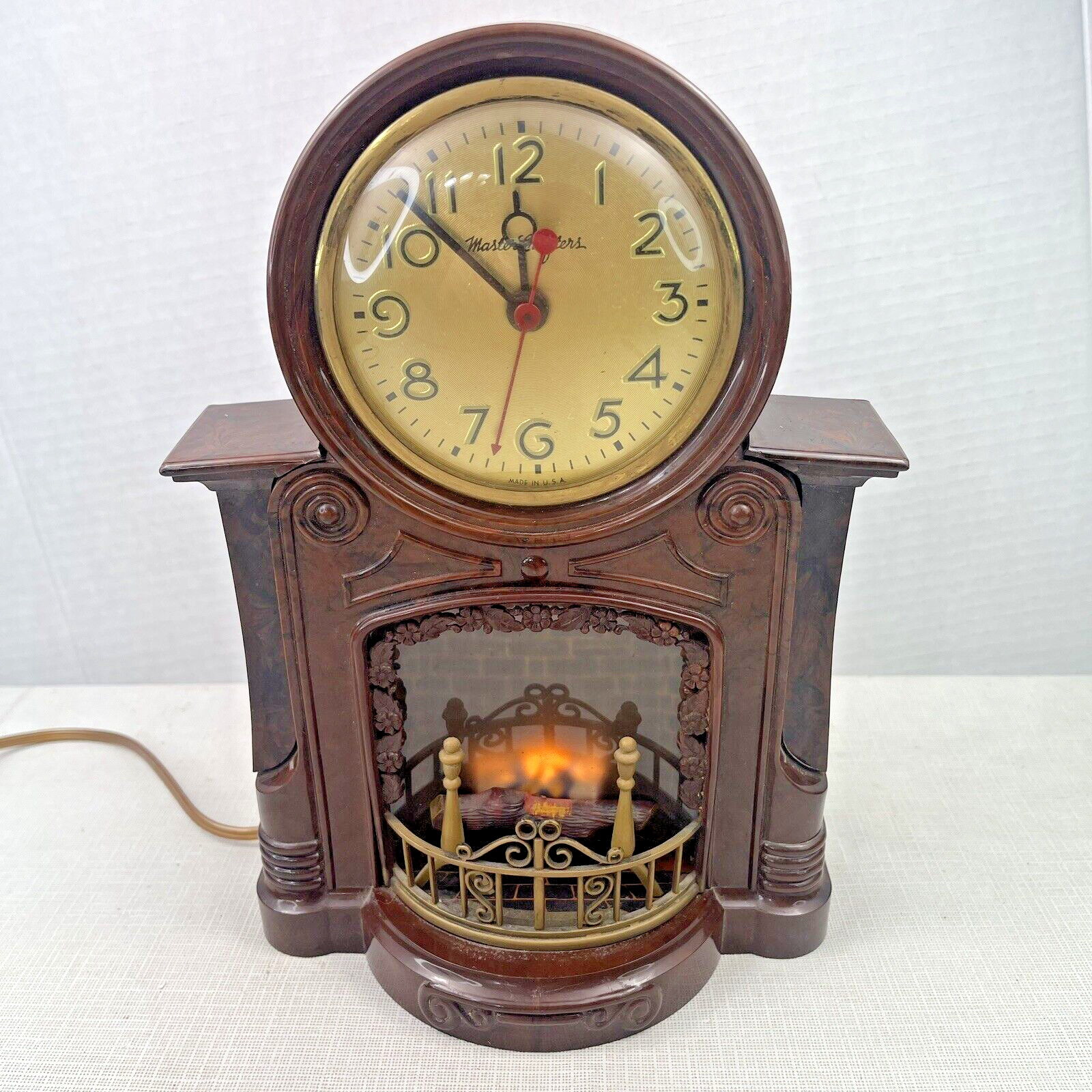 Vintage MasterCrafters Fireplace Electric Clock Action Line Model 1582 WORKS