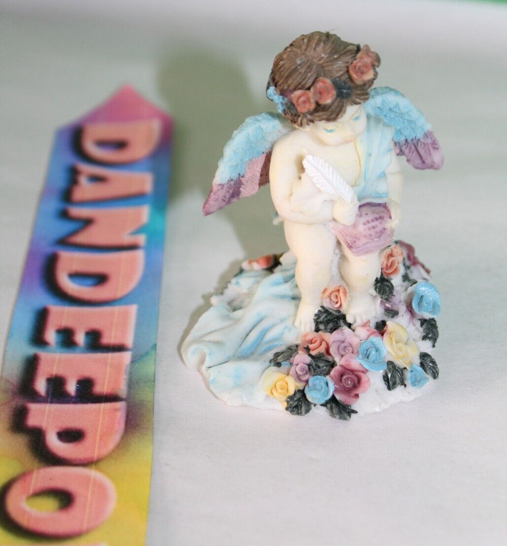 Vintage CWI Angel Figurine With Flowers