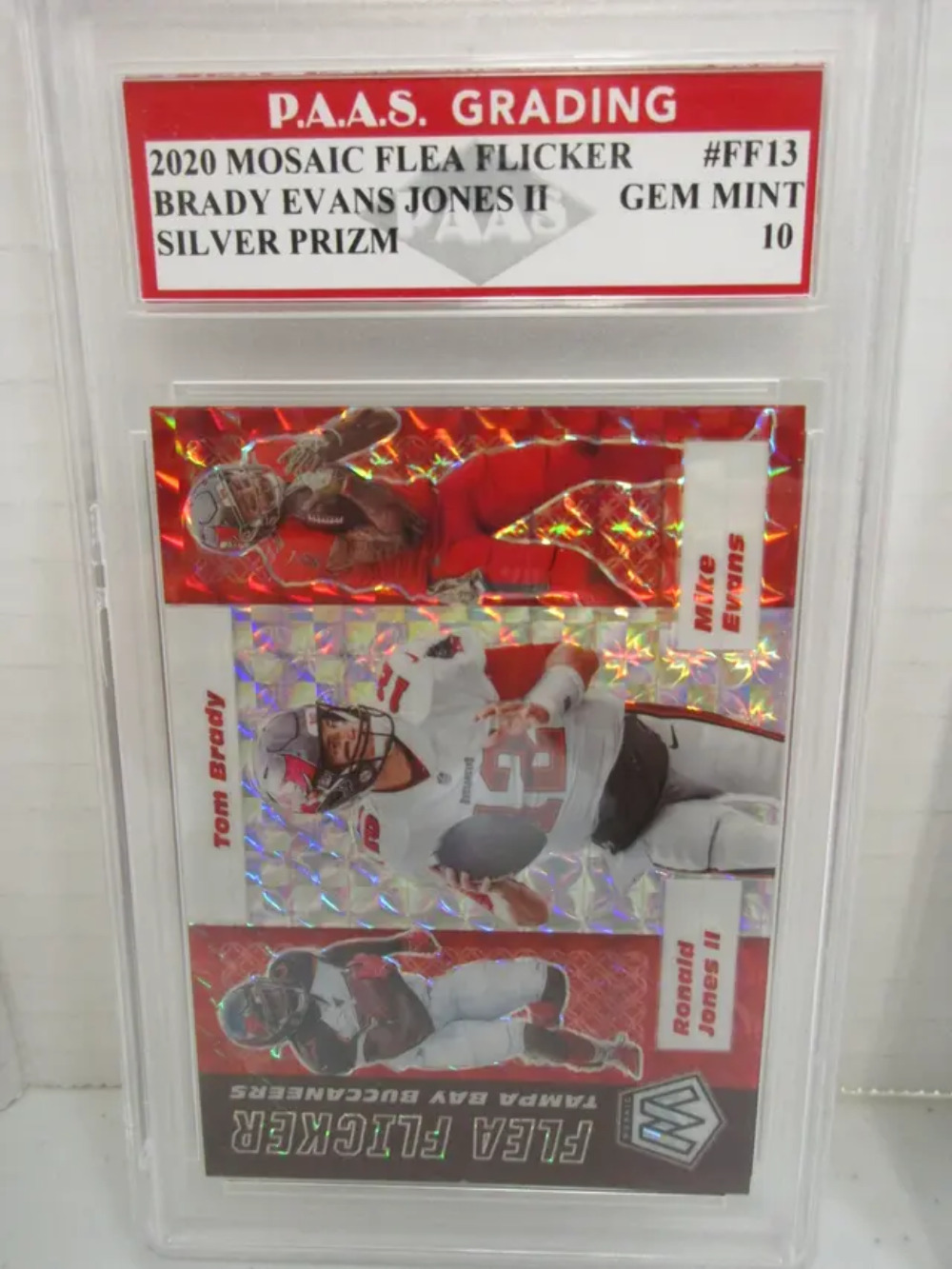 Tom Brady, Evans, Jones II 2020 Mosaic Flea Flicker Silver Prizm #FF13 graded PA