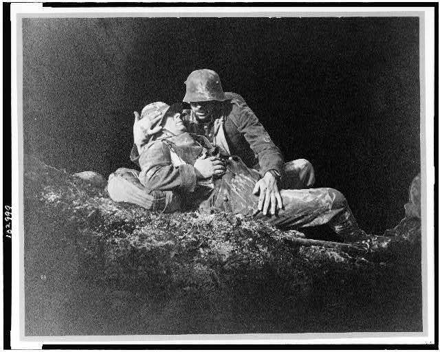 Still,motion picture Stosstrupp 1917,show,soldier holding fallen comrade,c1933