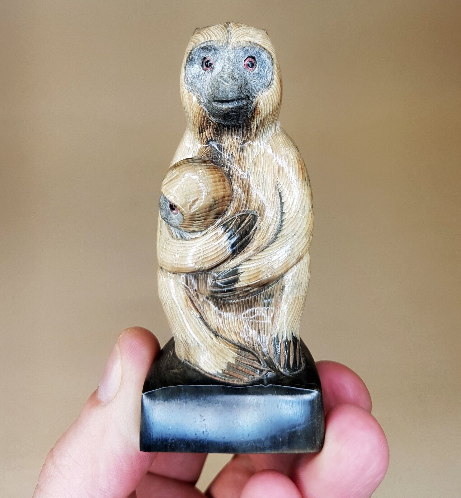 MAGNIFICENT RARE MINIATURE BUFFALO HORN CARVING OF A FEMALE MACAQUE WITH A BABY
