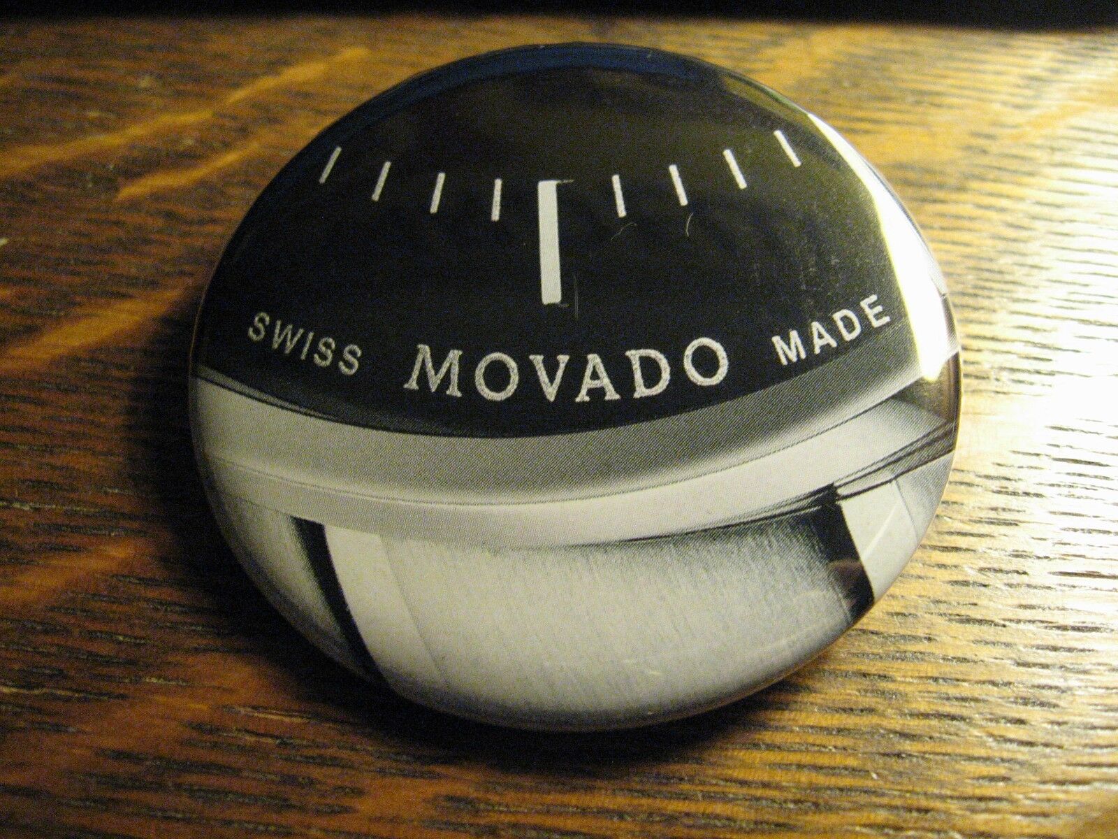 Movado Swiss Made Luxury Wrist Watch Logo Advertisement Pocket Lipstick Mirror