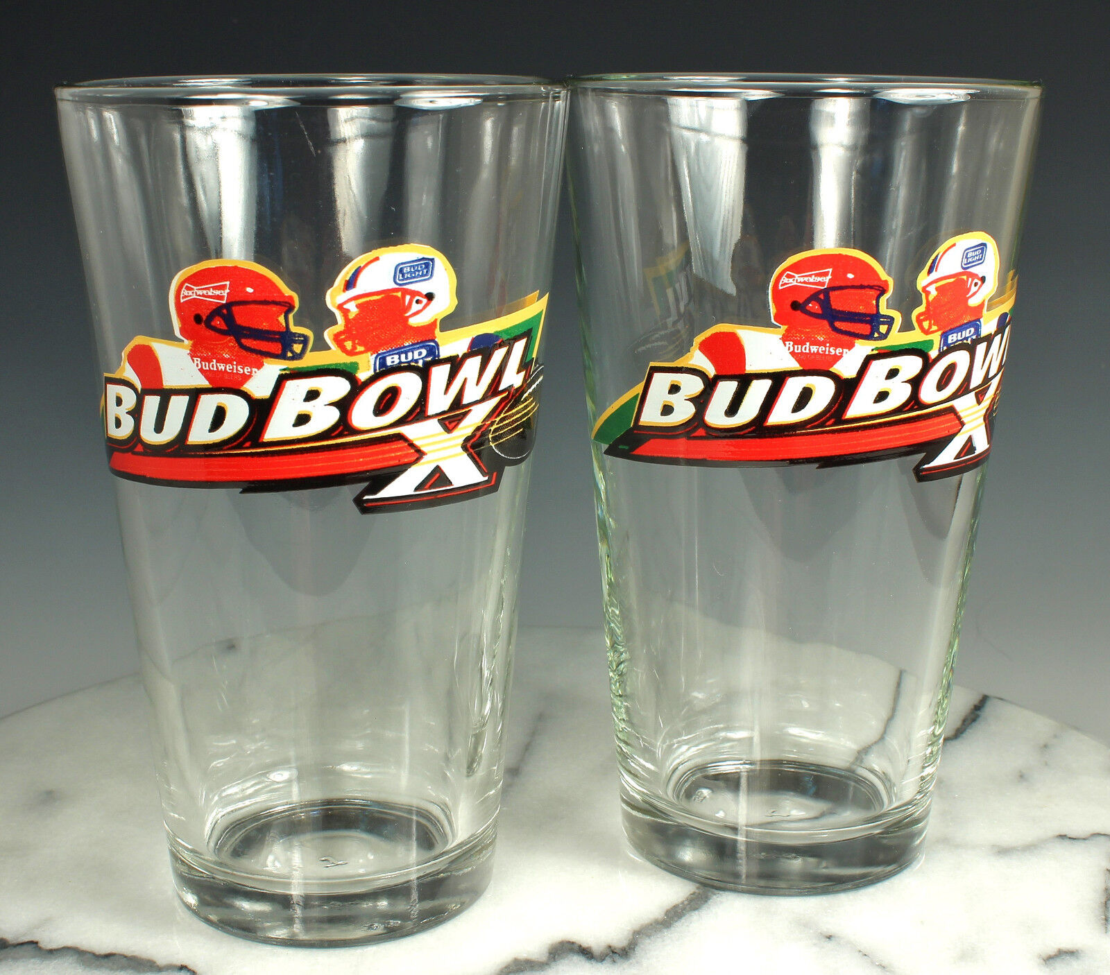 2 SUPER BOWL X Beer Glasses 1976 STEELERS v COWBOYS Bud Bowl Pint NEW Old Stock 