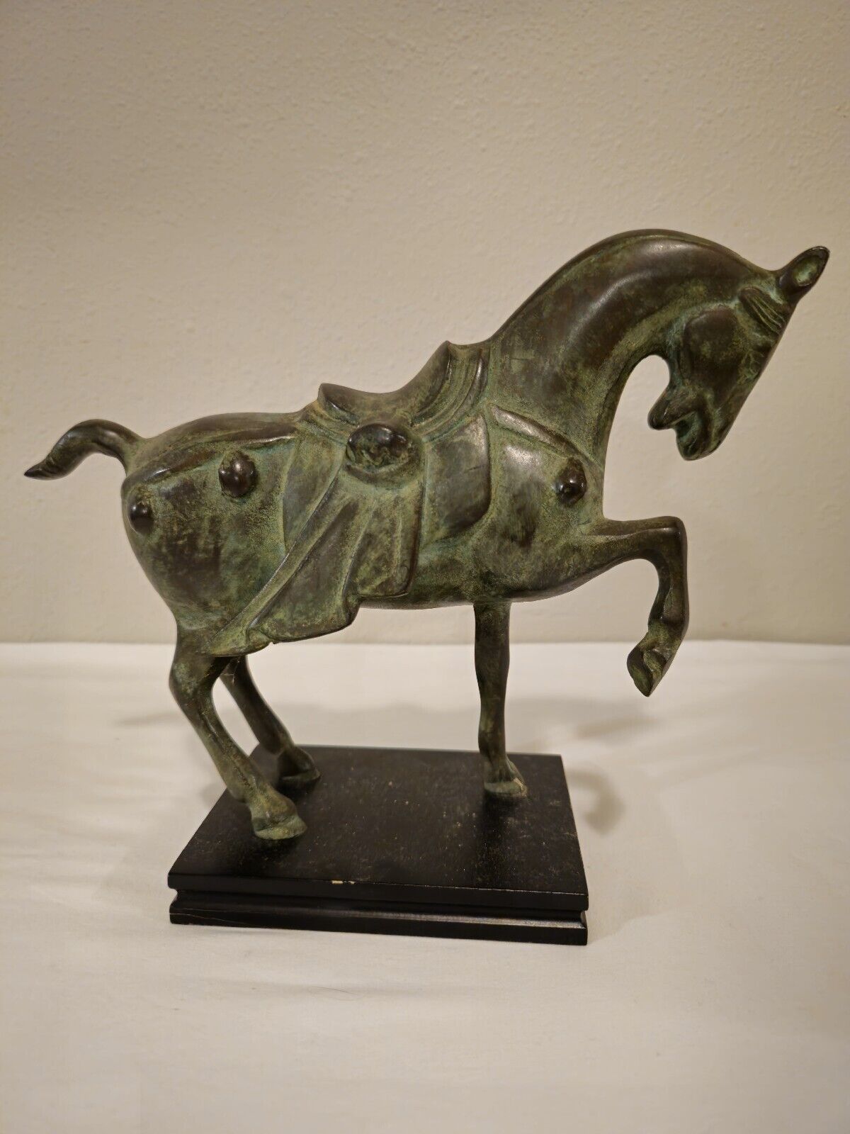 TANG STYLE ANTIQUE GREEN BRONZE METAL PRANCING HORSE STATUE WITH WOOD BASE. 