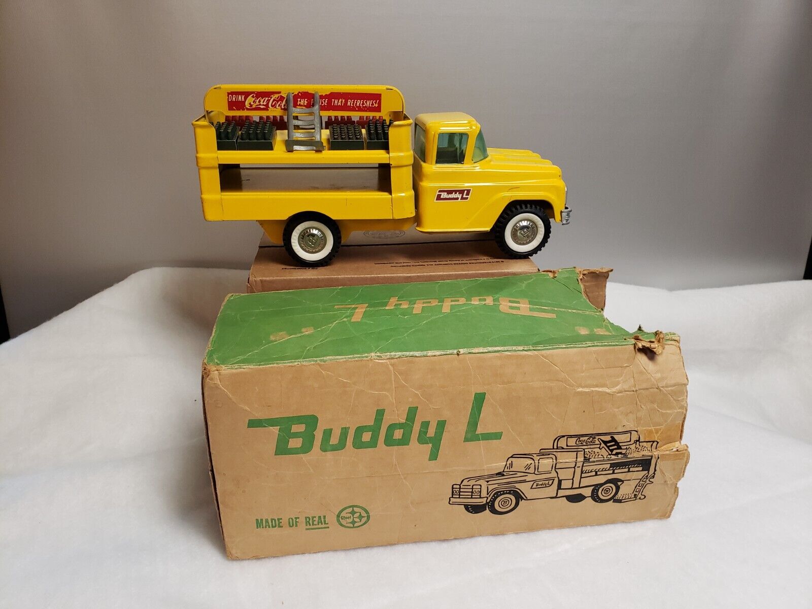 Vtg. 1960\'s Buddy L Coca Cola delivery truck,partial box, bottles, hand trucks