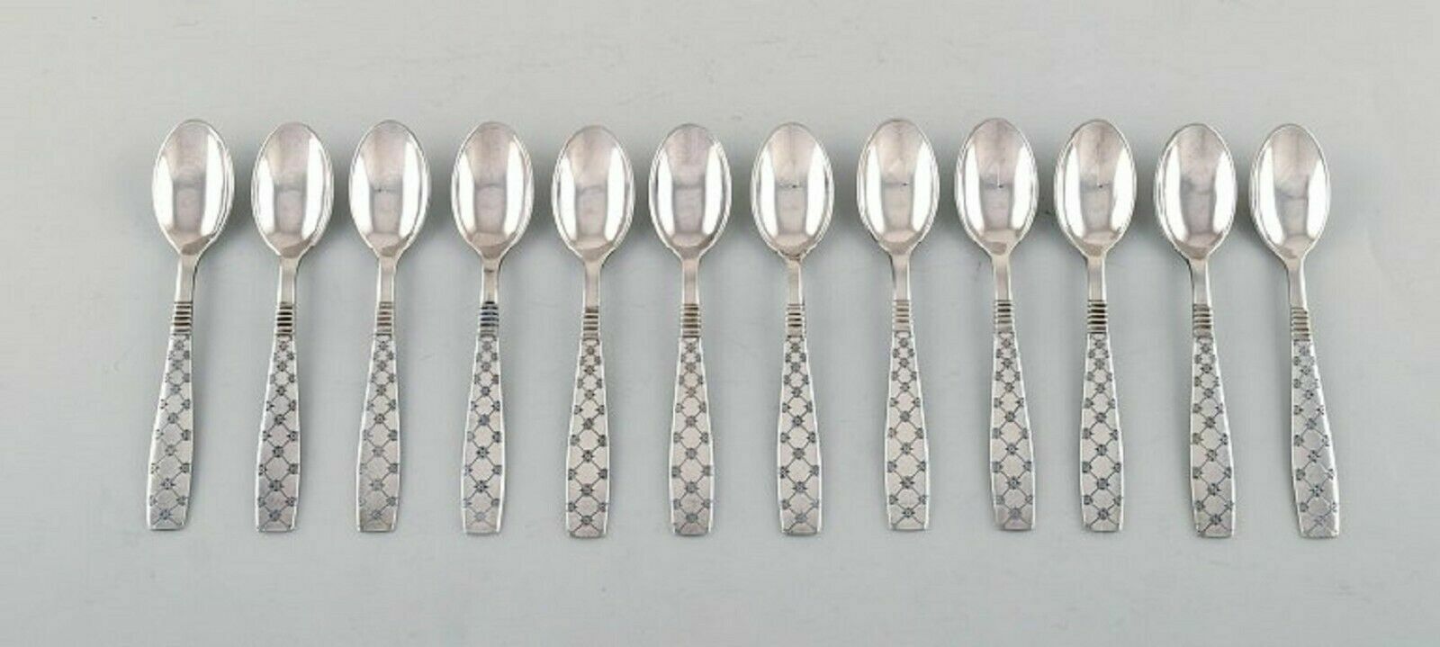 Jens H. Quistgaard (1919-2008), Denmark. 12 Star teaspoons in plated silver.