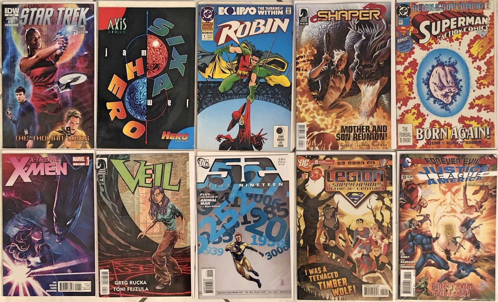 10 Comics Justice League 52 X-Men Veil Star Trek Superman Robin and more