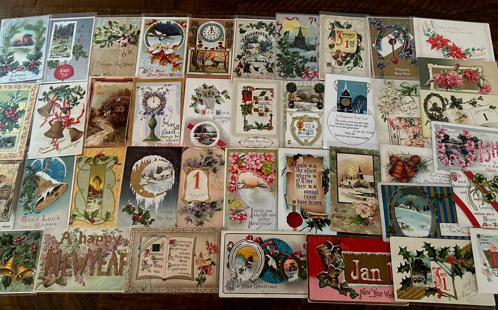 Lot of  40 Antique~NEW YEAR'S ~Vintage Holiday ~Postcards~1900's~in Sleeves~h888