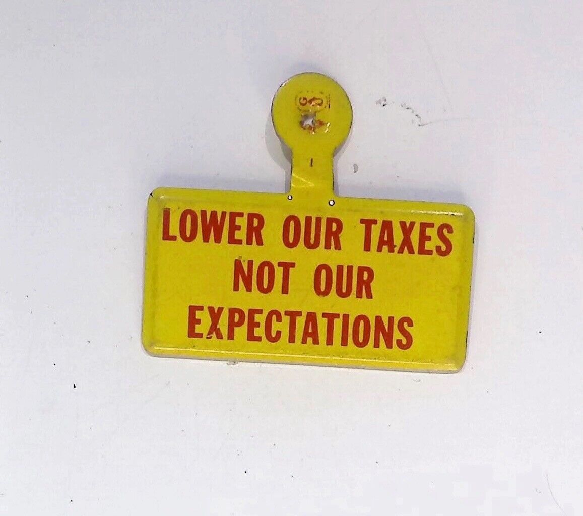 LOWER OUR TAXES NOT EXPECTATIONS FOLDING LIBERTARIAN 1960S VINTAGE  BUTTON PIN