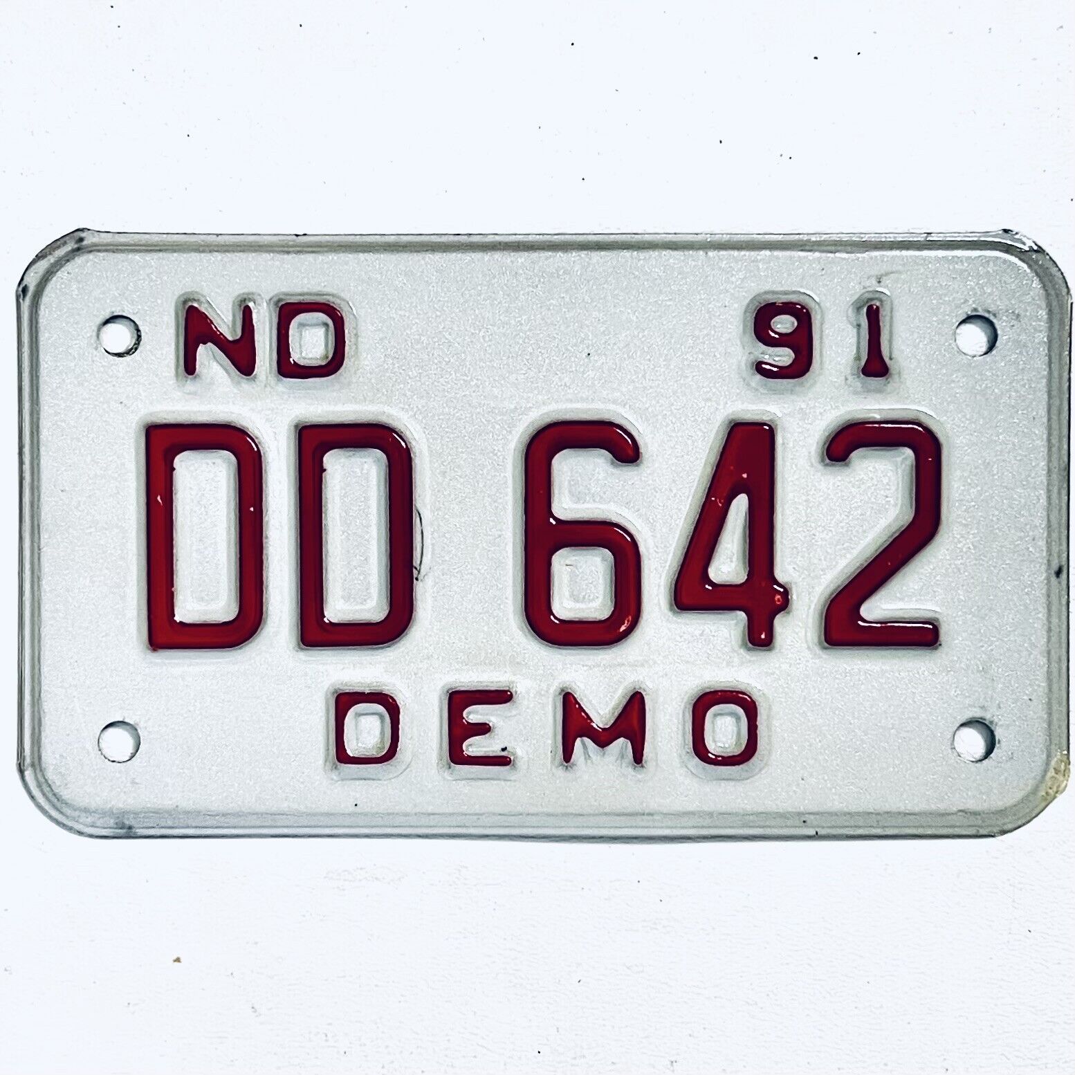 1991 United States North Dakota DEMO Special License Plate DD 642