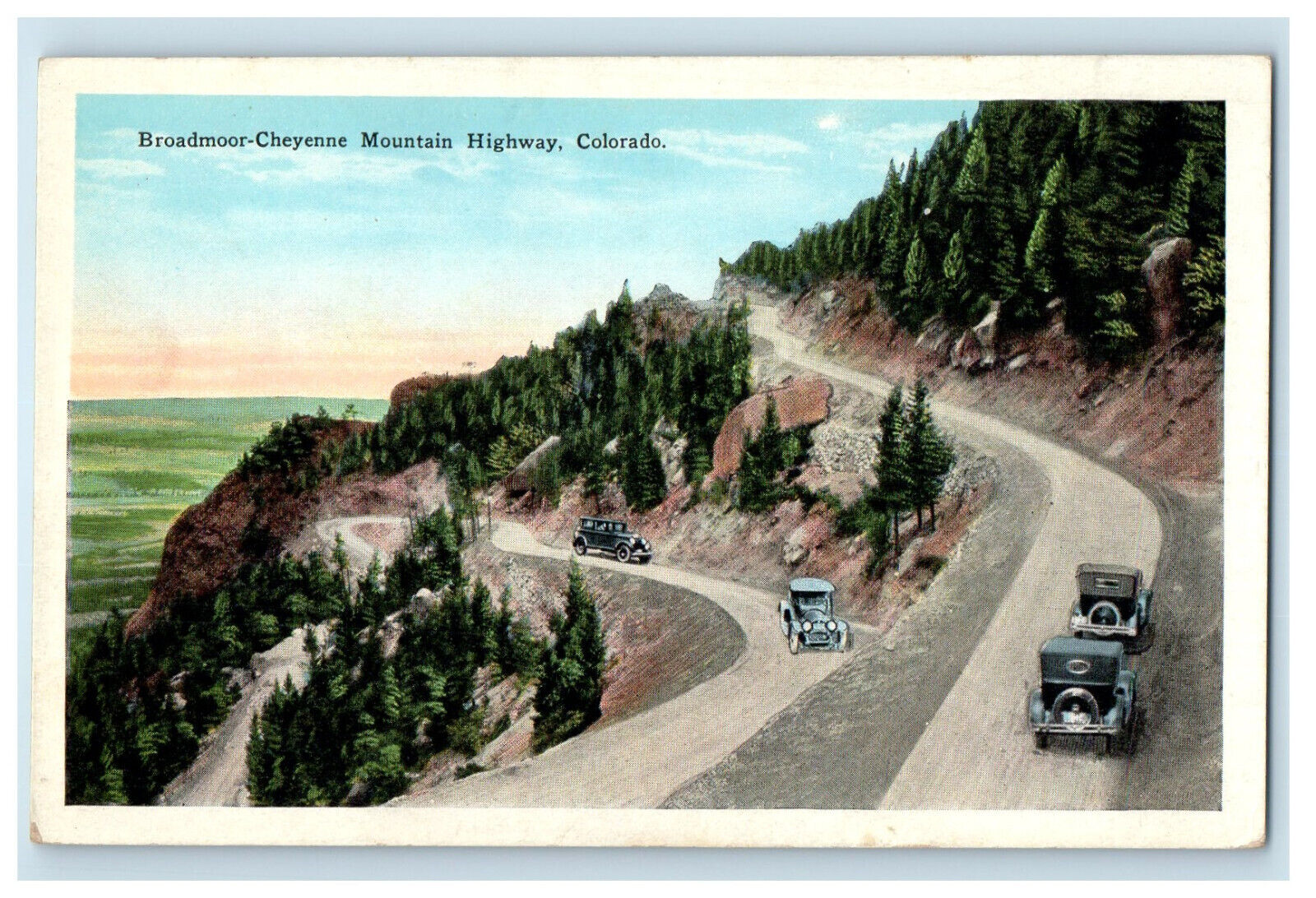 c1920s Car Passing Broadmoor-Cheyenne Mountain Highway Colorado CO Postcard