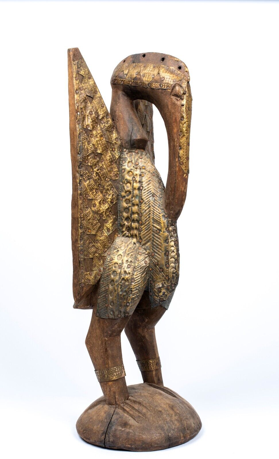 A West African Metal and Wood Bird Figure, Senufo Style