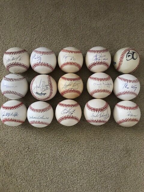 Autographed Baseballs (15 non authenticated signed balls). 