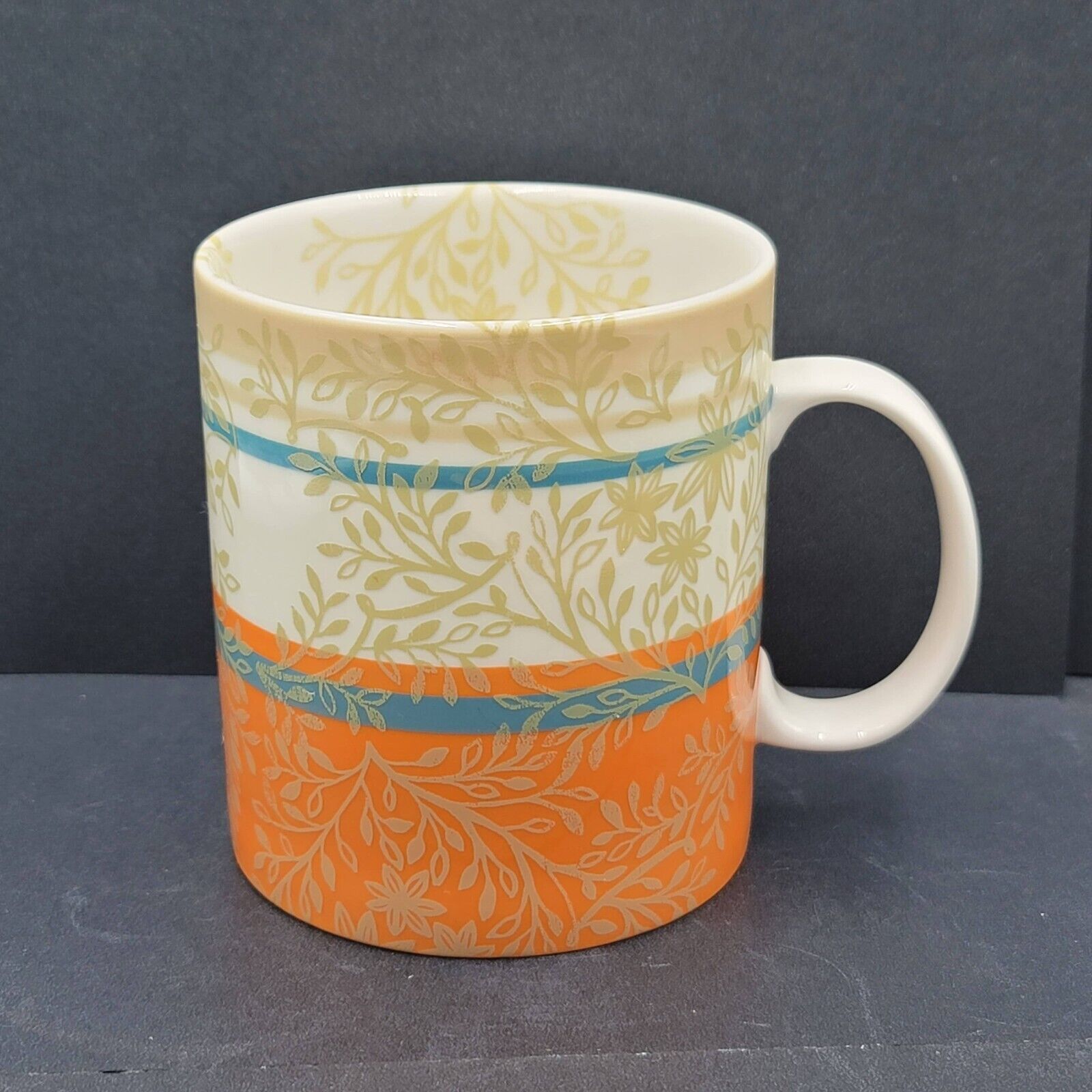 Starbucks 2008 Ceramic 14oz Coffee Mug Cup White Orange Tan Leaves Teal Stripe 