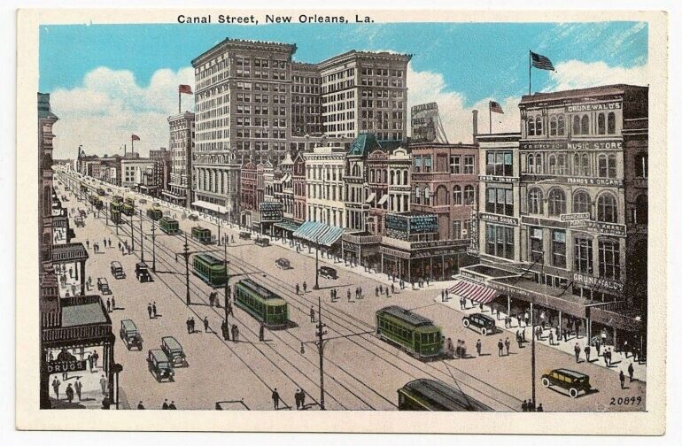 Many Trolley Cars Canal Street New Orleans LA Postcard