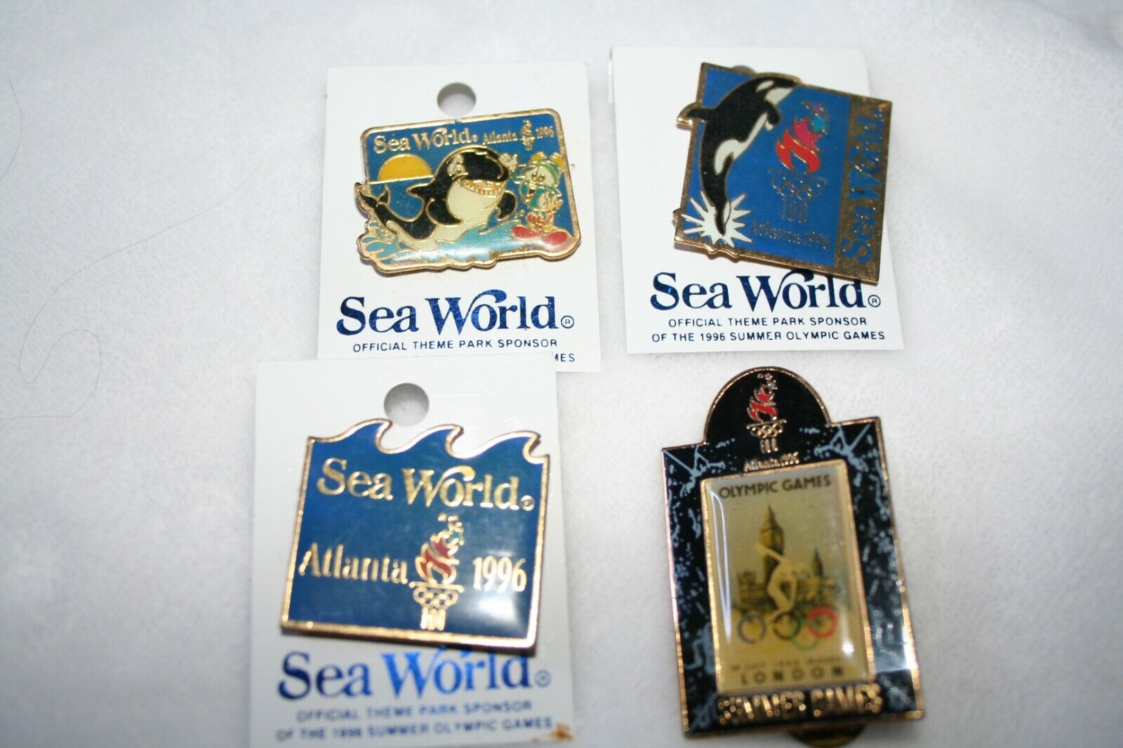 OFFICIAL 1996 OLYMPIC SUMMER GAMES SEA WORLD SET OF PINS
