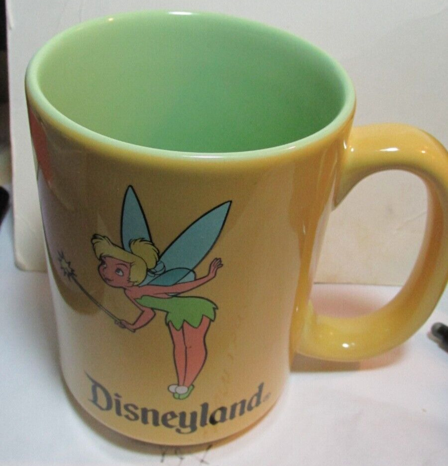 VINTAGE DISNEY MADE IN THAILAND TINKER BELL YELLOW COFFEE OR TEA MUG 14 O/Z
