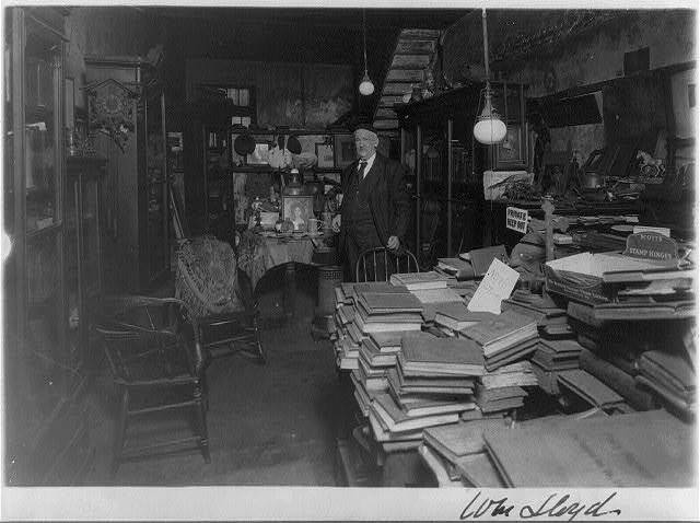 Photo:William Lloyd,born 1854,cluttered room,standing,c1920\'s