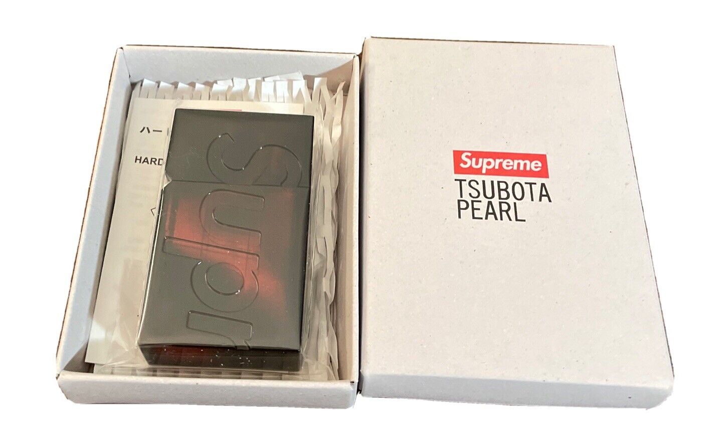 SUPREME/ TSUBOTA PEARL HARD EDGE LIGHTER/ RED/ OS/ FW21/ AUTHENTIC/ BRAND NEW