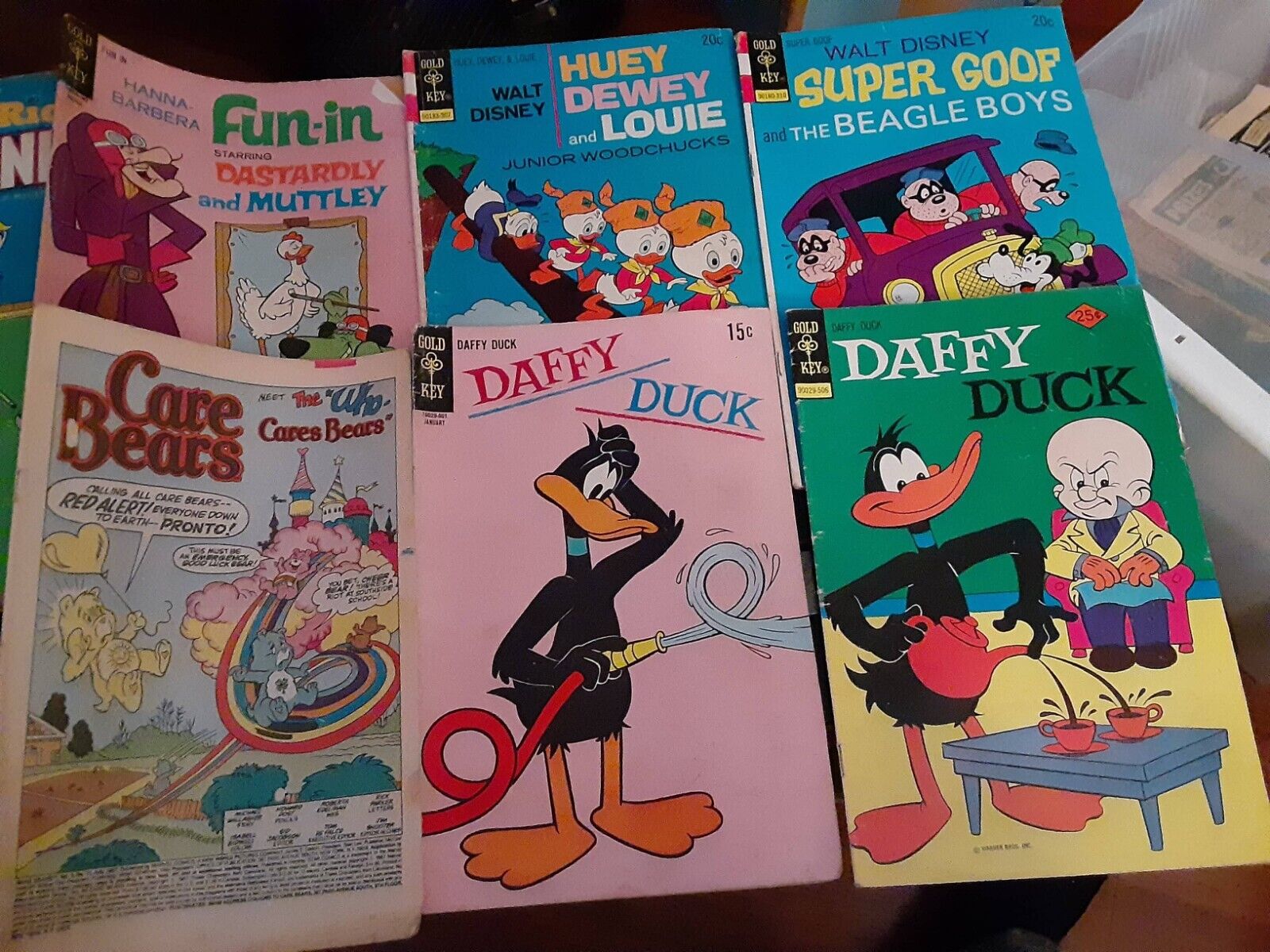 5 Gold Key Comics Lot: Daffy Duck, Super Goof, Huey Dewey and Louie + Care Bears