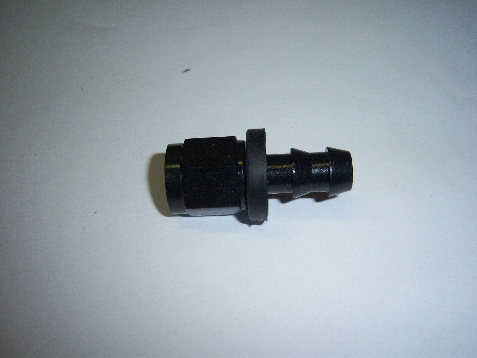 #8AN  FEMALE SWIVEL TO 1/2 HOSE BARB FUEL ADAPTER BLACK
