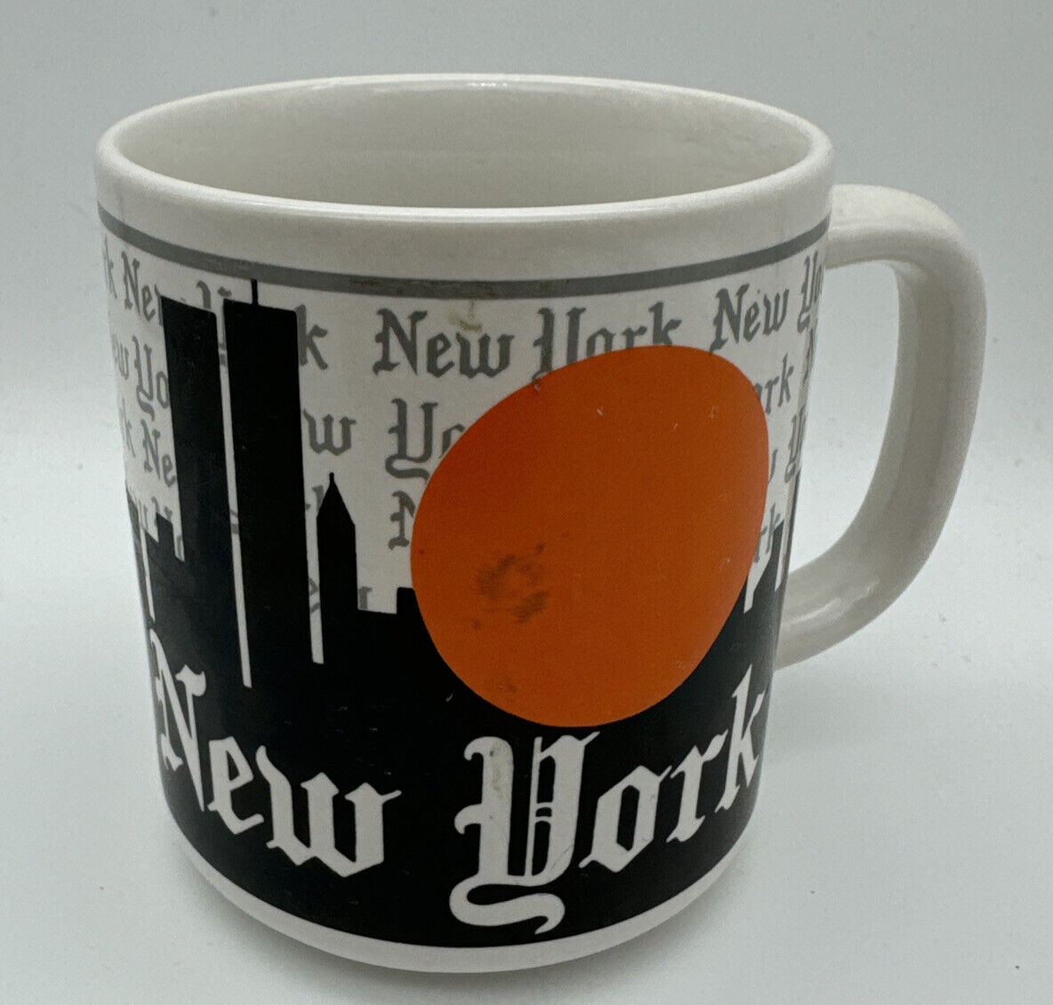 Vintage New York City Skyline Mug Twin Towers Sun Old English Font by MPC EUC