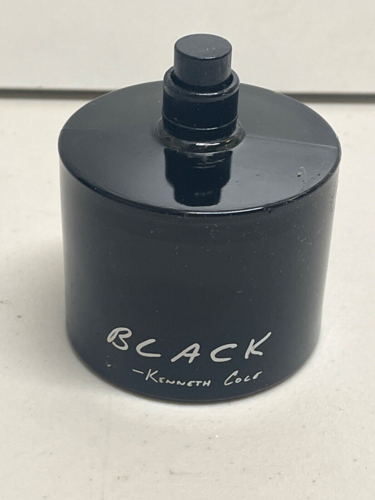 Black Kenneth Cole 100 ML partially full 