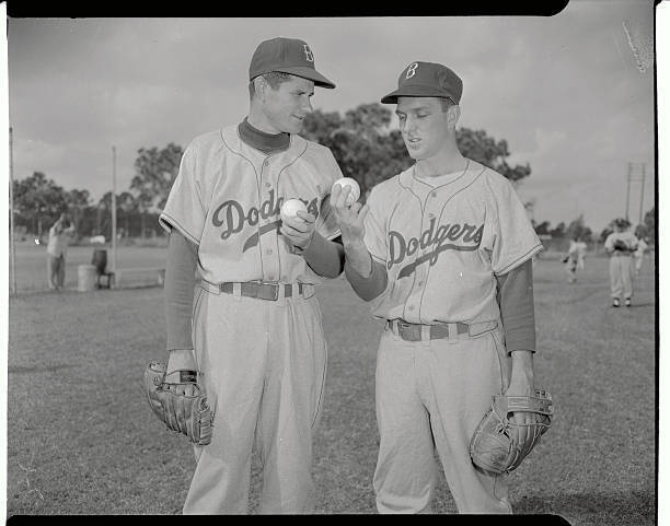 Preacher Roe and Carl Erskine Eyeing Baseball - This photo sho - 1953 Old Photo