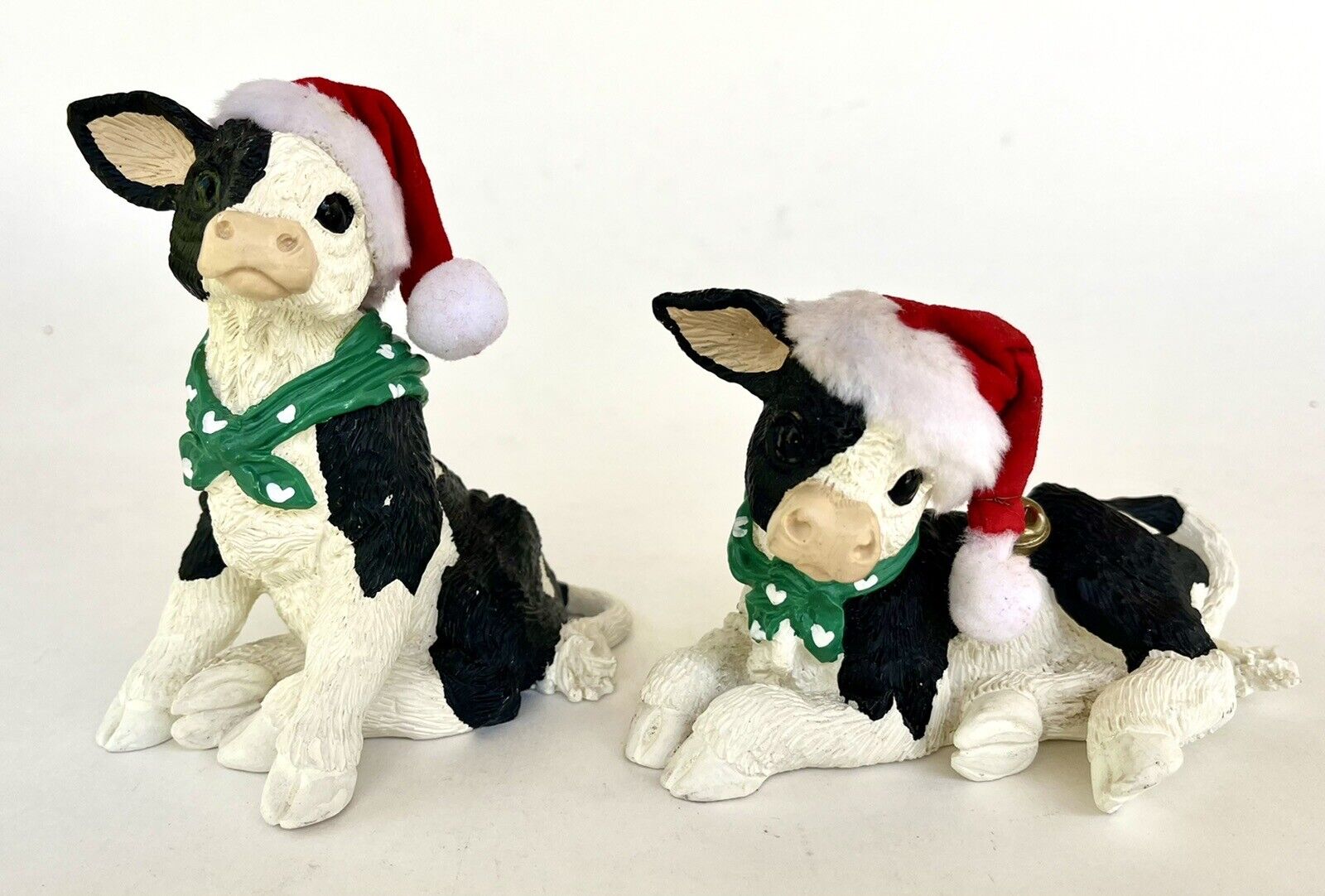 Enesco Black & White Cows Santa Hat Green and White Heart Scarf 4.5 In High