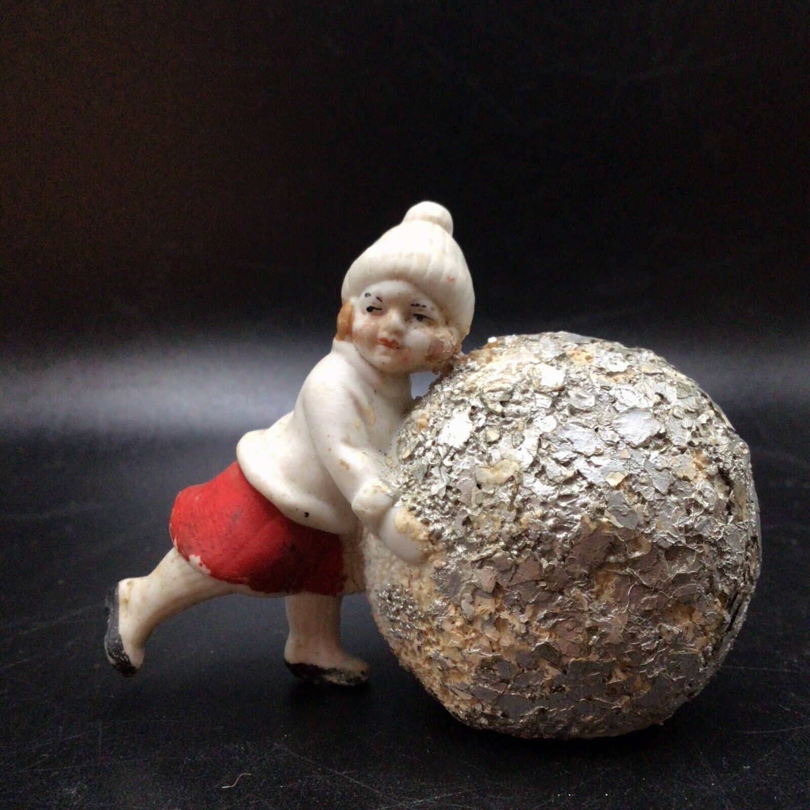 Vtg Antique Snow Baby Girl pushing snowball German porcelain bisque putz figure