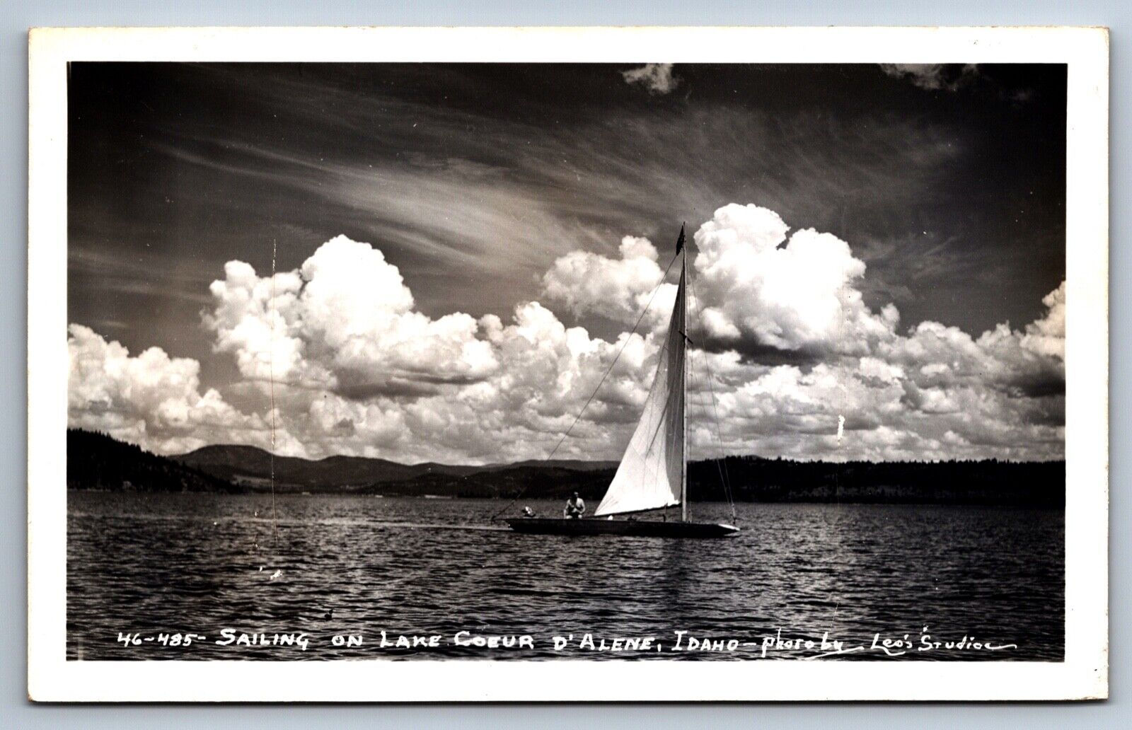RPPC Postcard Lake Coeur d'Alene Idaho Sailing Boat 1946 Single Boater Photo Leo