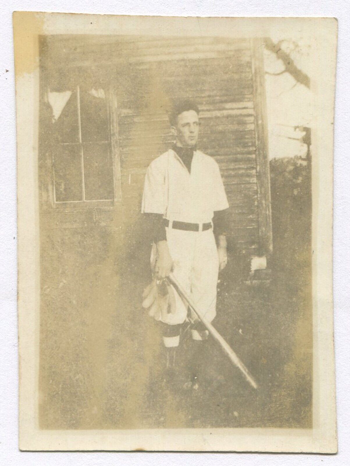 BASEBALL PLAYER IN UNIFORM. TONED SILVER PRINT 3.25X2.25. 1920-30s. 