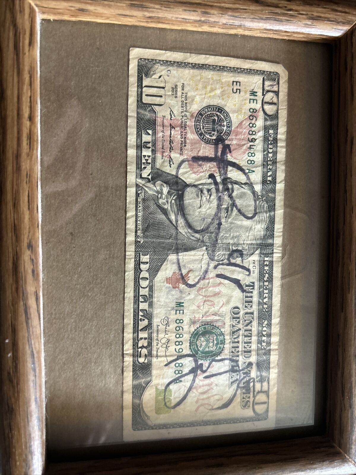 Steelers Autographed 10 Dollar Bill -Leveon Bell, Devin Bush, And Jesse James