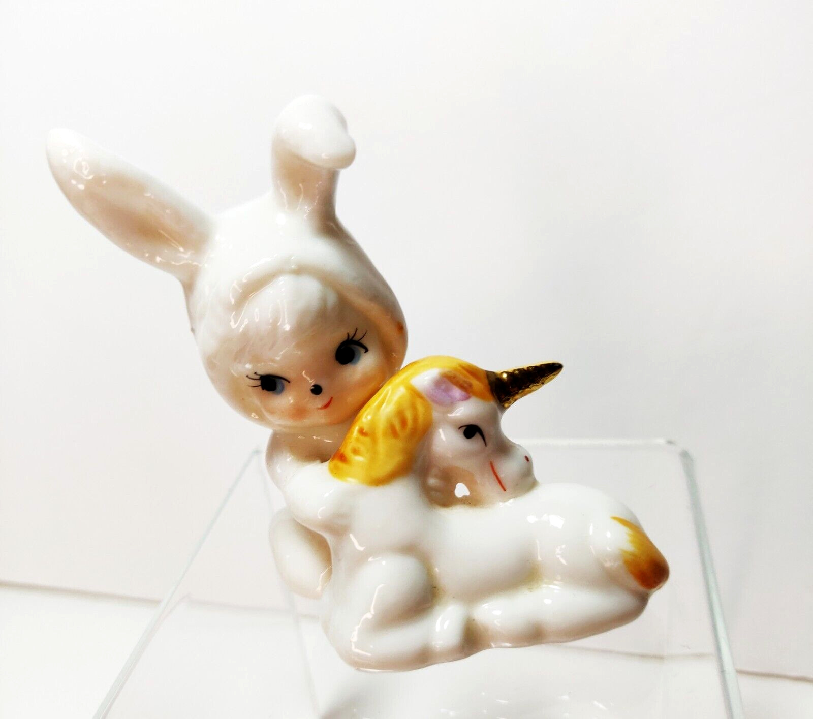 Vintage 1980s Figurine Pixie in Bunny Costume Hugging Unicorn