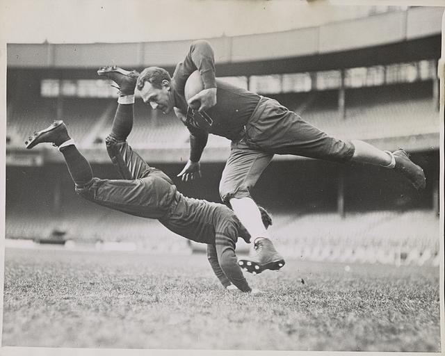 Photo:1935 NFL Football Red Grange & Joe Zeller tackle