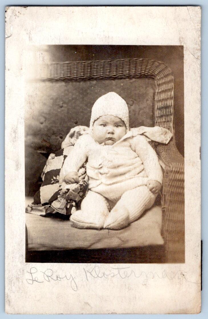 1920\'s RPPC LEROY KLOSTERMAN BABY WICKER CHAIR (BORN 7/1/24 CUMBERLAND MARYLAND)