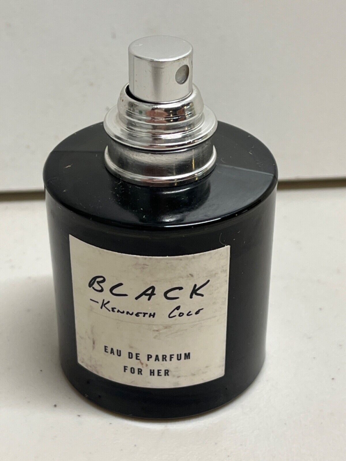 Black Kenneth Cole Eau De Parfum for Her 50 ml bottle partially full