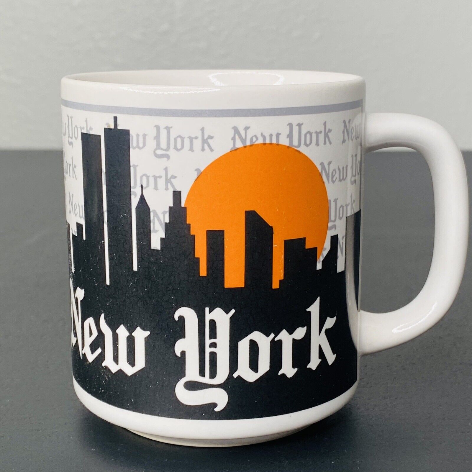 Vintage New York City Skyline Mug Twin Towers Sun Old English Font by MPC EUC
