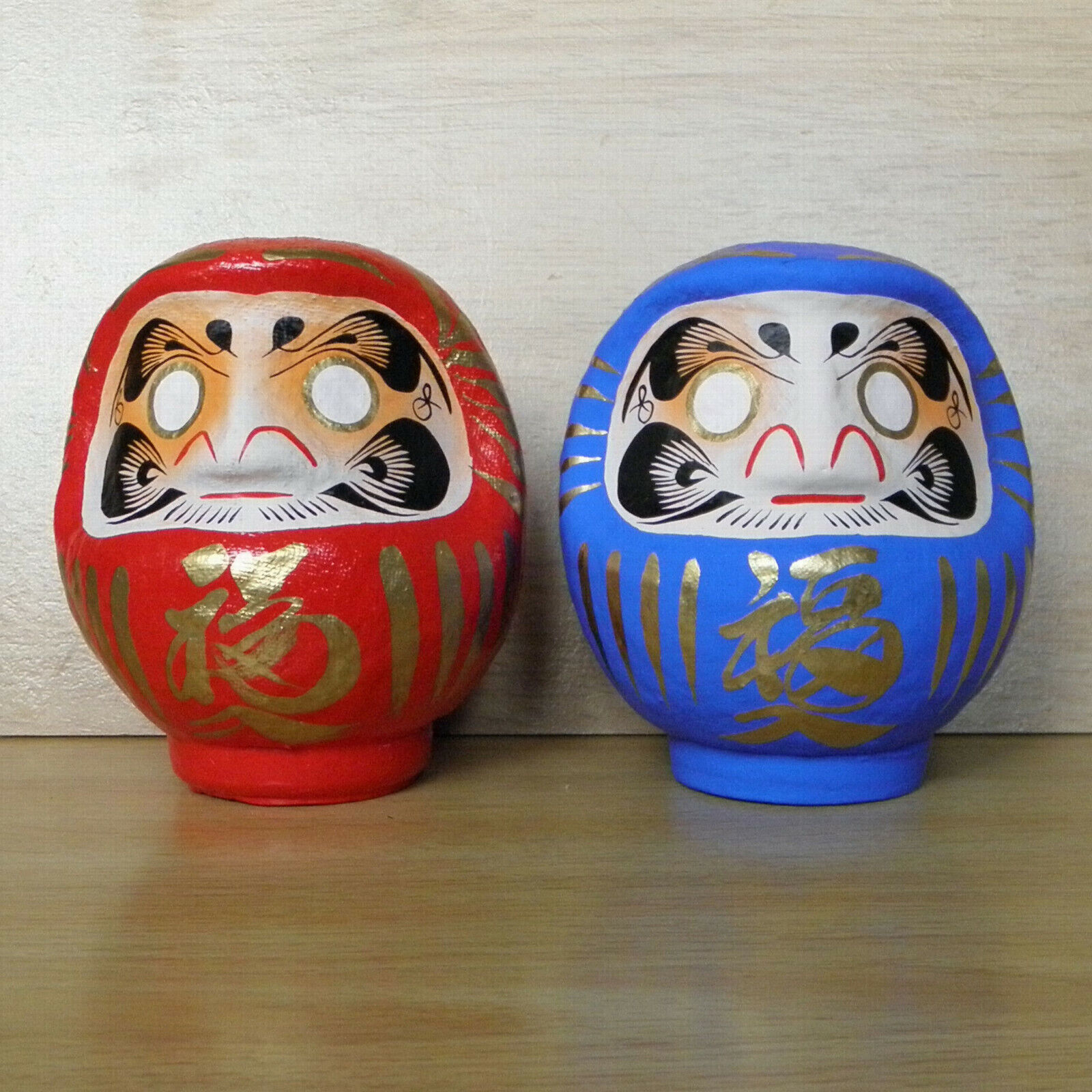 a pair of small Daruma Doll in red & blue colors : No 1 size with a marker pen