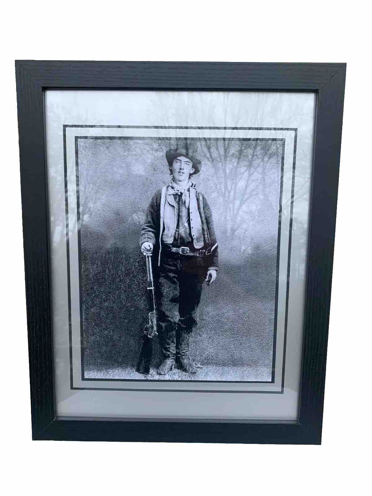 A FRAMED  POSTER FOR BILLY THE KID