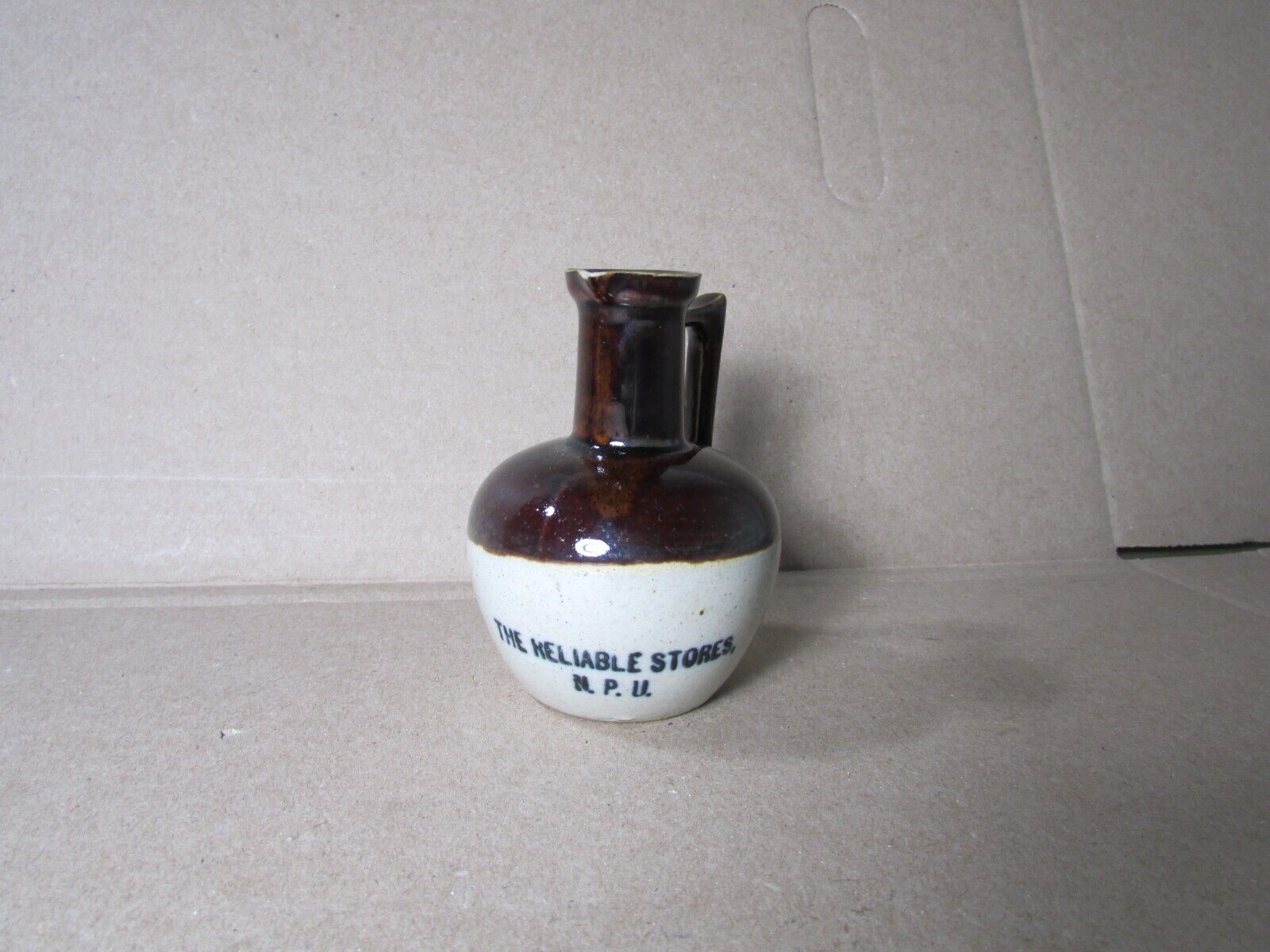 Small Antique Miniature Stoneware Advertising Jug The Reliable Stores NPU