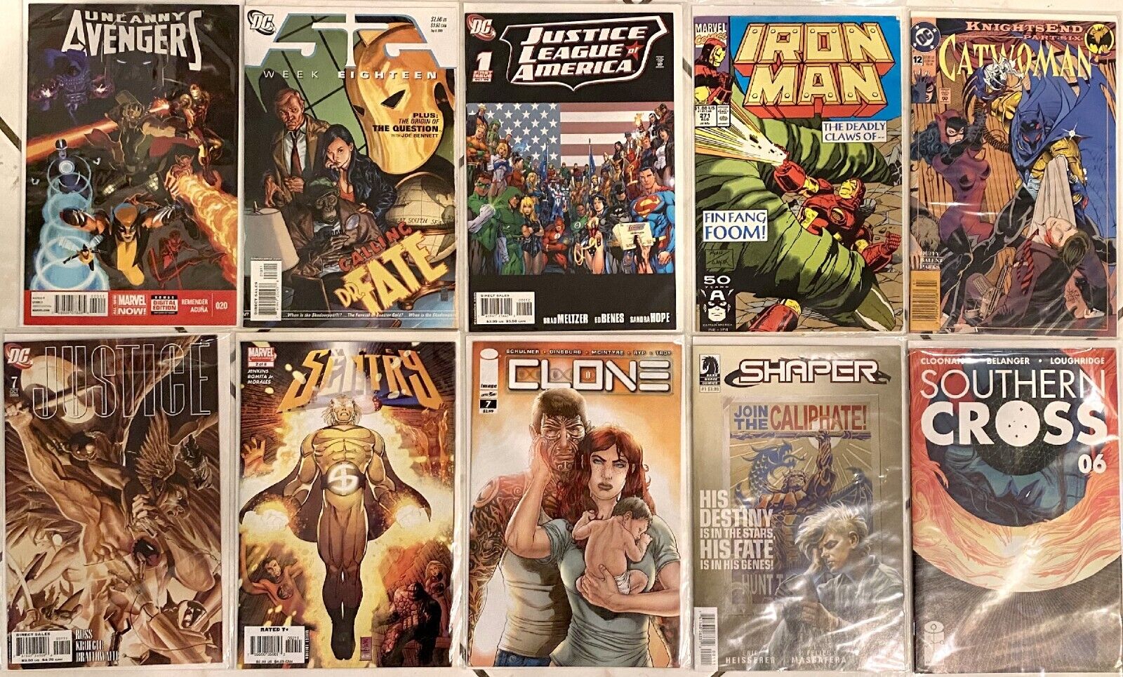 10 Comic Books Iron Man Catwoman Sentry Clone Justice Dr. Fate Avengers and more
